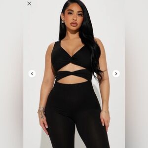 Fashion Nova Black Flared Cutout Jumpsuit